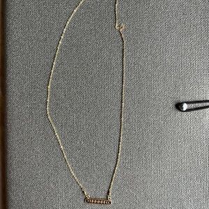 Boutique gold tone moon phases necklace